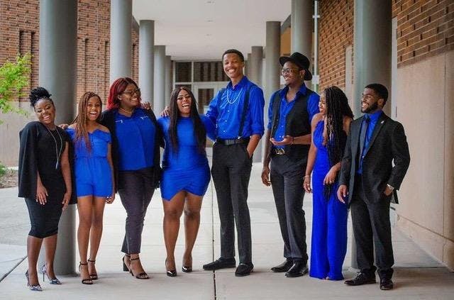 <p>Executive board members MSU chapter of Black Student Alliance pose for a group photo. Image courtesy of Tofi Adegbite.</p>