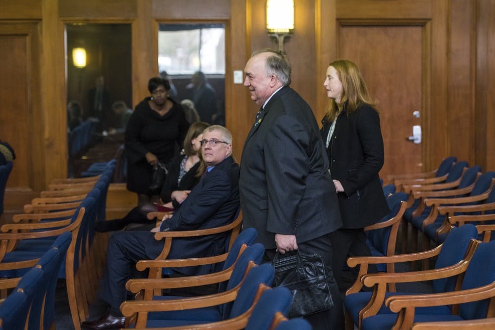 MSU Interim President John Engler makes his appearance at the Senate's higher education subcommittee meeting on March 15, 2018 at the Boji Tower in Lansing. (Nic Antaya | The State News)
