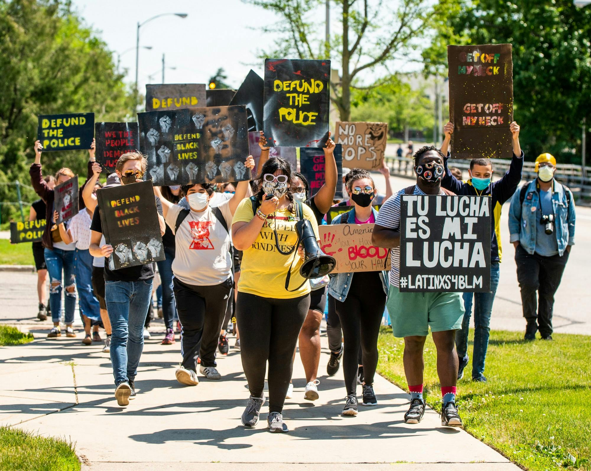 A crowd of mostly students walks to ELPD from MSU for a die-in protest June 12, 2020.