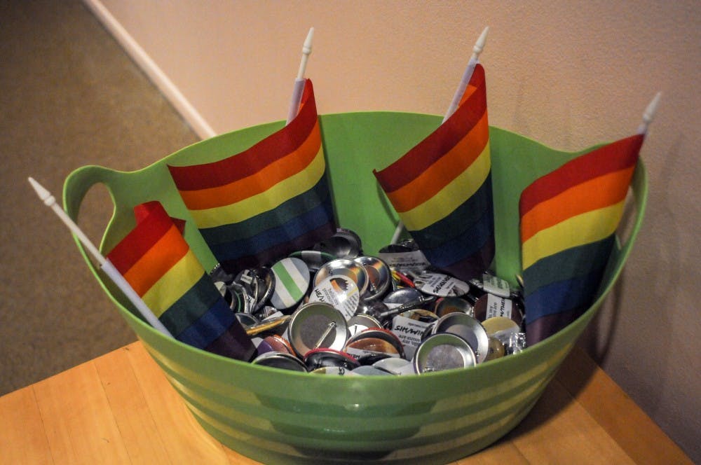 Flags and buttons at the MSU Pride Prom at the MSU Museum on April 5, 2019.
