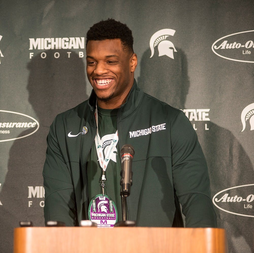 <p>Junior defensive end Shilique Calhoun talks with the press about his plans to continue playing at MSU next season Jan. 11, 2015, during a press conference at Breslin Center. Erin Hampton/The State News</p>
