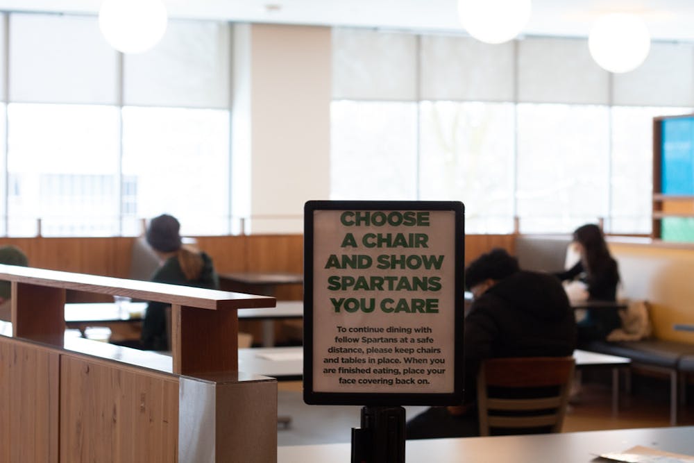 <p>Students sit socially distanced in The Edge dining hall at Akers Tuesday, Jan. 19, 2021.</p>