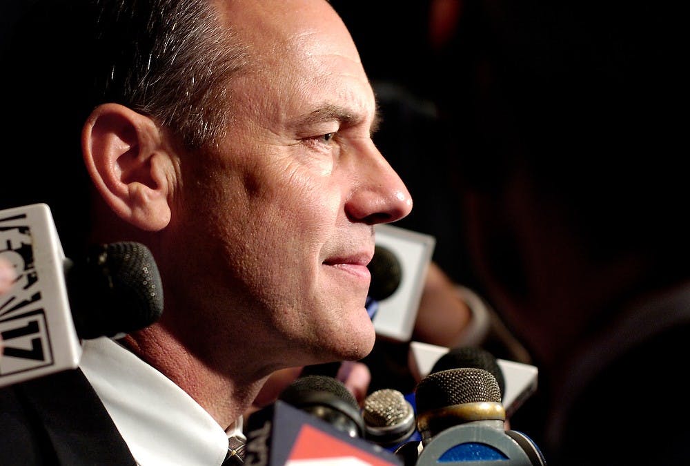 <p>MSU football's new head coach Mark Dantonio takes questions after a press conference Nov. 27, 2005, at the Clara Bell Smith Student-Athlete Academic Center. Dantonio coached the Cincinnati Bearcats for the last three seasons, establishing himself within his first year as head coach by achieving their first winning season in 23 years. He stressed the importance of recruiting and faith, and outlined some of his strategies for leading up the Spartans in 2007. Jolie Myers/The State News</p>