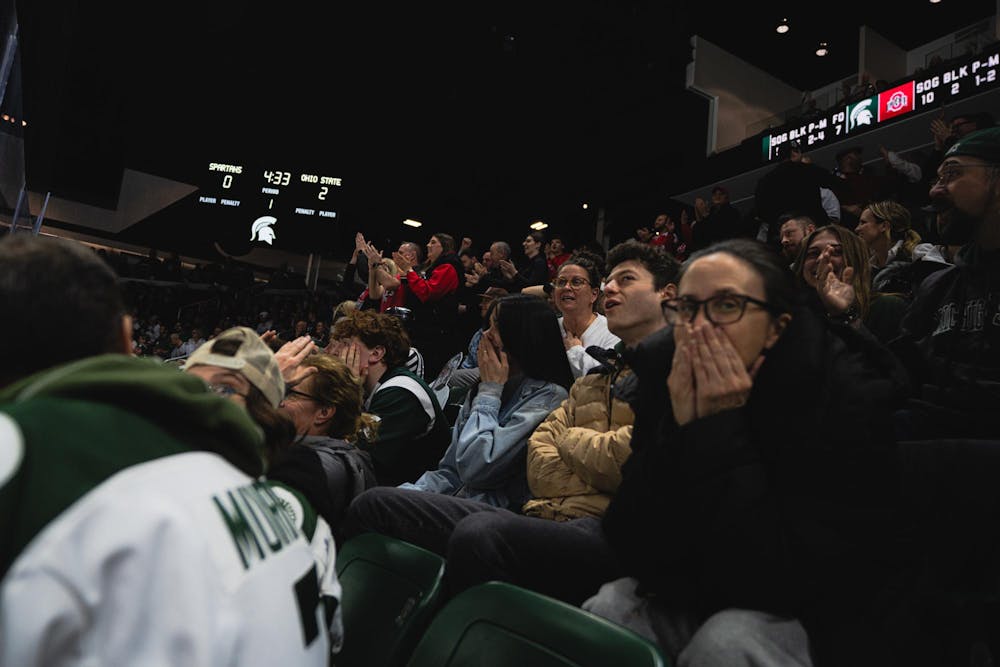 <p>OSU Men's Hockey fans celebrate after a goal while MSU fans display emotion at the Munn Ice Arena in East Lansing, MI, on Feb. 27, 2026.</p>