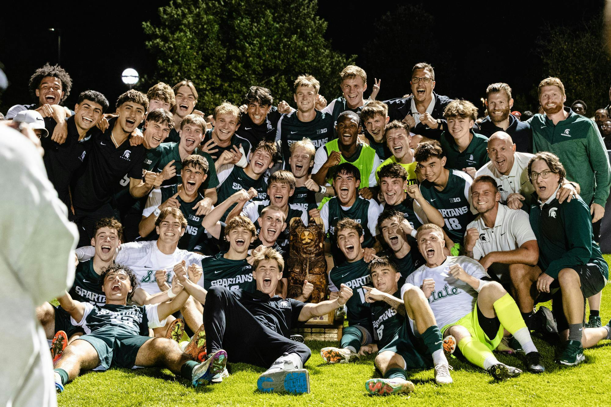 <p>The Michigan State mens soccer team celebrates during a picture with the Big Bear Trophy after winning it in Ann Arbor, Michigan on Sept. 26, 2025.</p>