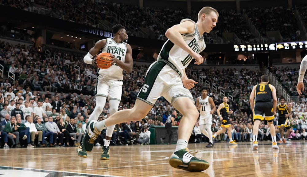 <p>Graduate foward Joey Hauser (10) and Junior center Mady Sissoko (22) at the Iowa v. MSU game held at the Breslin Center on Jan. 26, 2023, The Spartans defeated the Hawkeyes 61-63.</p>