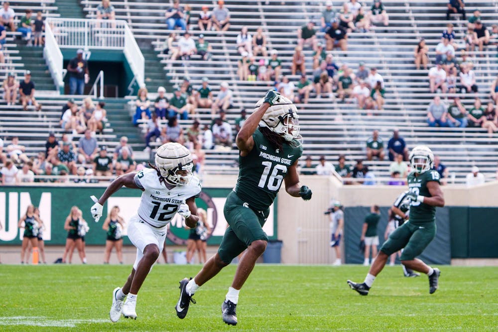 Redshirt junior wide receiver Christian Fitzpatrick (16) calls for the ball during the MSU football spring open practice, held at Spartan Stadium on April 15, 2023.