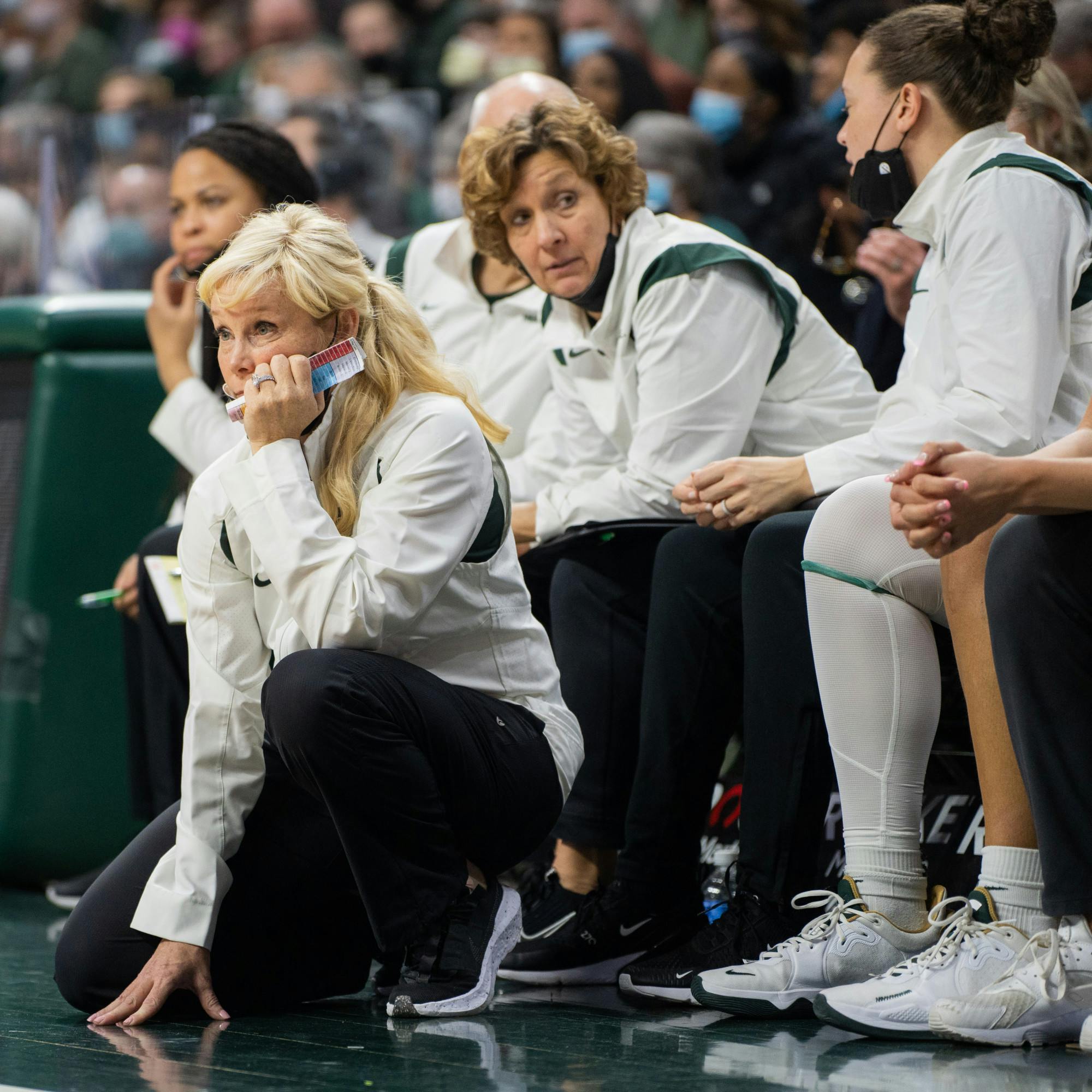 <p>Head women's basketball coach Suzy Merchant watches as her players take on the Buckeyes. The Spartans lost 61-55 against Ohio State University at the Breslin Center on Feb. 27, 2022.</p>
