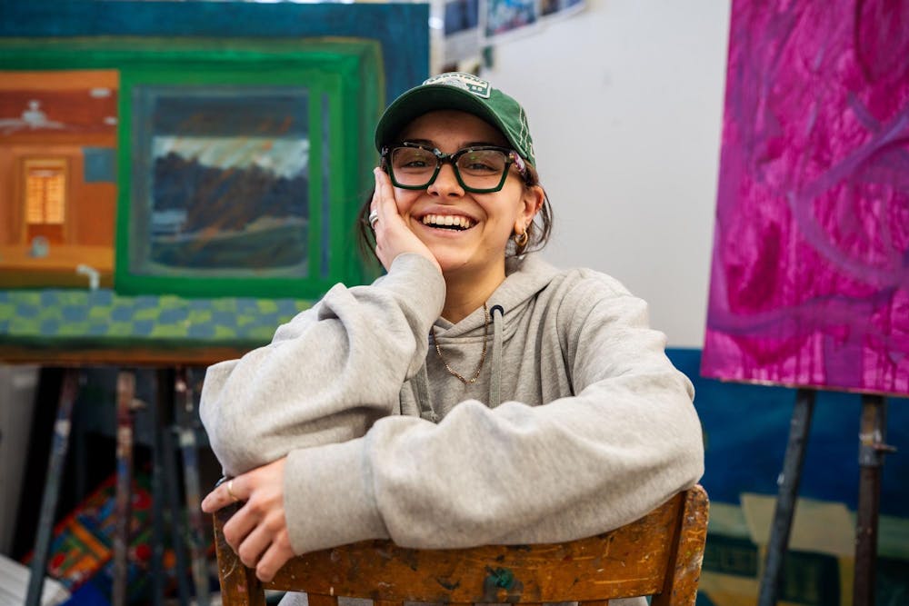 Fourth-year Michigan State studio art student Evan Yalowitz poses in her studio within the Kresge Art Center on April 4, 2025. When asked what advice she’d give to students entering the studio art program, she said, “Be a sponge. Try everything. Be open to feedback, even when it’s hard. It’s not always easy being an artist, but this place—and the people in it—have helped me become who I am.”