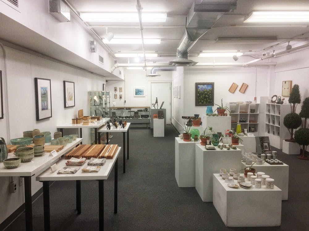 <p>Artwork and gifts fill the Michigan Made Holiday Exhibition gallery in the Lansing Art Gallery and Education Center. <strong>Photo courtesy of Katrina M. Daniels</strong></p>
