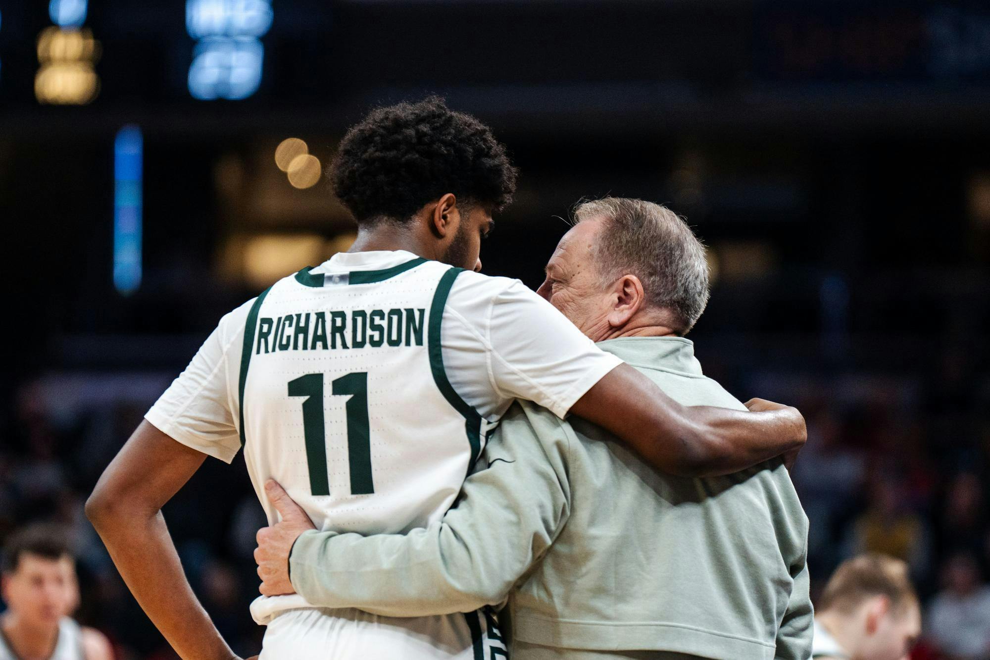<p>Michigan State freshman guard Jase Richardson (11) speaks with men's basketball head coach Tom Izzo during the Big Ten Conference Tournament at Gainbridge Fieldhouse in Indianapolis on March 15, 2025. Michigan State lost to Wisconsin 77-74. </p>