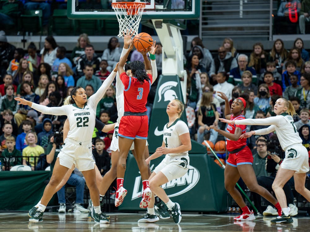 <p>Delaware State senior guard Alexis Moragne shoots a jumper during the Spartans&#x27; 86-37 win on Nov. 7.</p>