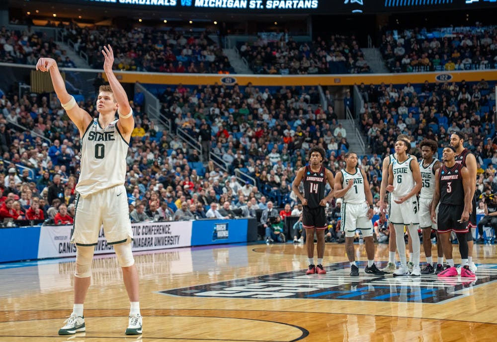 Senior forward Jaxon Kohler (0) shoots a free throw during the March Madness matchup against University of Louisville at the KeyBank Center in Buffalo, New York on March 21, 2026.