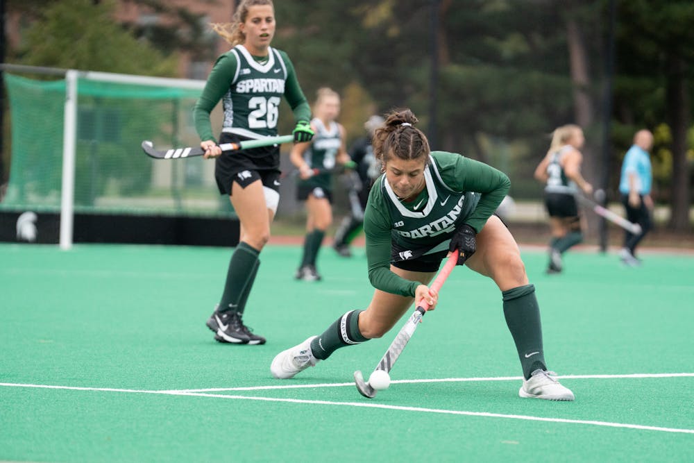 <p>Defender Celina Riccardo hits the ball down the field during the matchup against the Wolverines on Oct. 7, 2022.﻿</p>