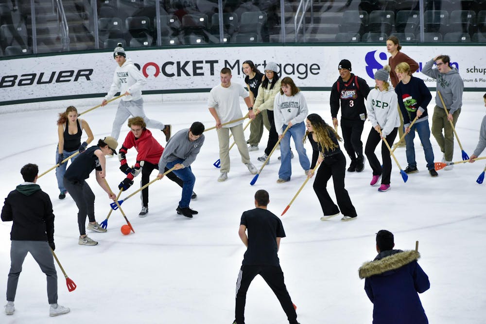 <p>The State News gathered for a chaotic game of broomball against the friendly foe Impact 89FM at Munn Ice Arena on Dec. 2, 2023. This game of broomball involved absolutely no organization, coordination or harmony across the team. Despite this, for the first time in several years, The State News came away with a triumphant win with a score of 5-1. Campus reporter Owen McCarthy and sports reporter Jacob Smith were unofficially named MVPs after unmatched efforts in both defensive and offensive plays. Blood was shed, chants were roared and bellowing laughs were heard across the ice in the monumental game.</p>