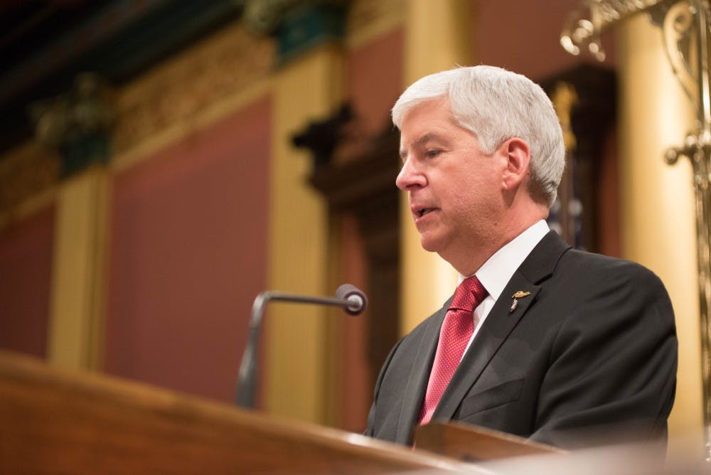 <p>Michigan Gov. Rick Snyder addresses the audience on Jan. 19, 2016 during the State of the State Address at the Capitol in Lansing, Michigan.</p>