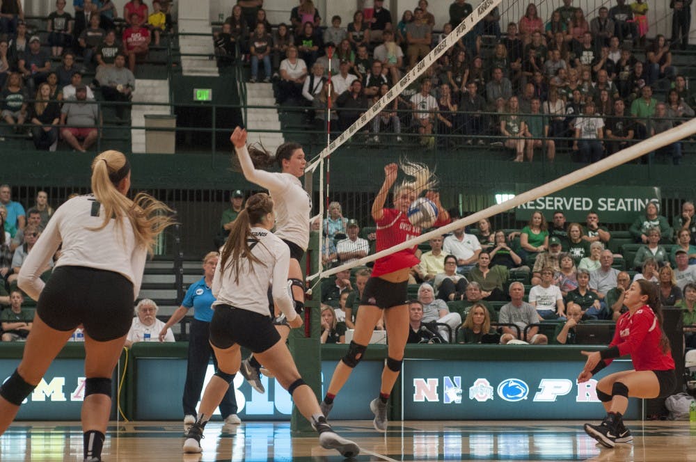 From left, senior outside hitter Chloe Reining (11), junior middle blocker Alyssa Garvelink (17) and redshirt junior outside hitter Autumn Bailey (2) watch the ball during the game against Ohio State University on Oct. 7, 2016 at Jenison Field House. The Spartans defeated the Buckeyes 3-0.