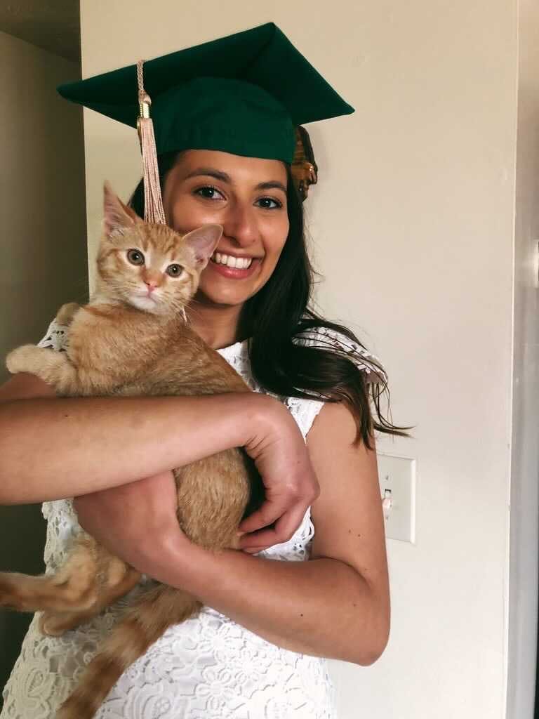 MSU alumna Isabel Kadar with Nova the cat. Photo courtesy of Kadar.