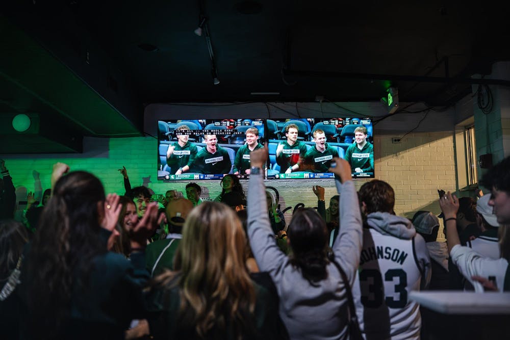 <p>Fans cheer while watching the NCAA men’s basketball tournament regional semifinal game between Michigan State and UConn at Fieldhouse in East Lansing, Michigan on Friday, March 27, 2026.</p>