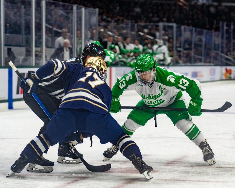 MSU Sr. F, Tiernan Shoudy (13), gets ready to battle over the puck in Munn Ice Arena in East Lansing, MI on Feb. 19, 2026.