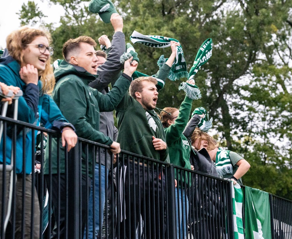 <p>The student section cheers on the MSU men&#x27;s soccer team at DeMartin Stadium on Sept. 27, 2022. Spartans defeated the Wolverines 2-0. </p>