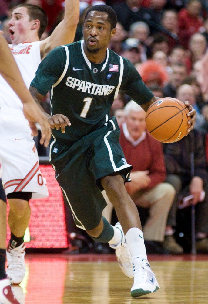 Senior guard Kalin Lucas drives the ball during the second half of Tuesday's game against Ohio State at Value City Arena in Columbus, Ohio. The Spartans fell to the Buckeyes, 71-61. Lauren Wood/The State News