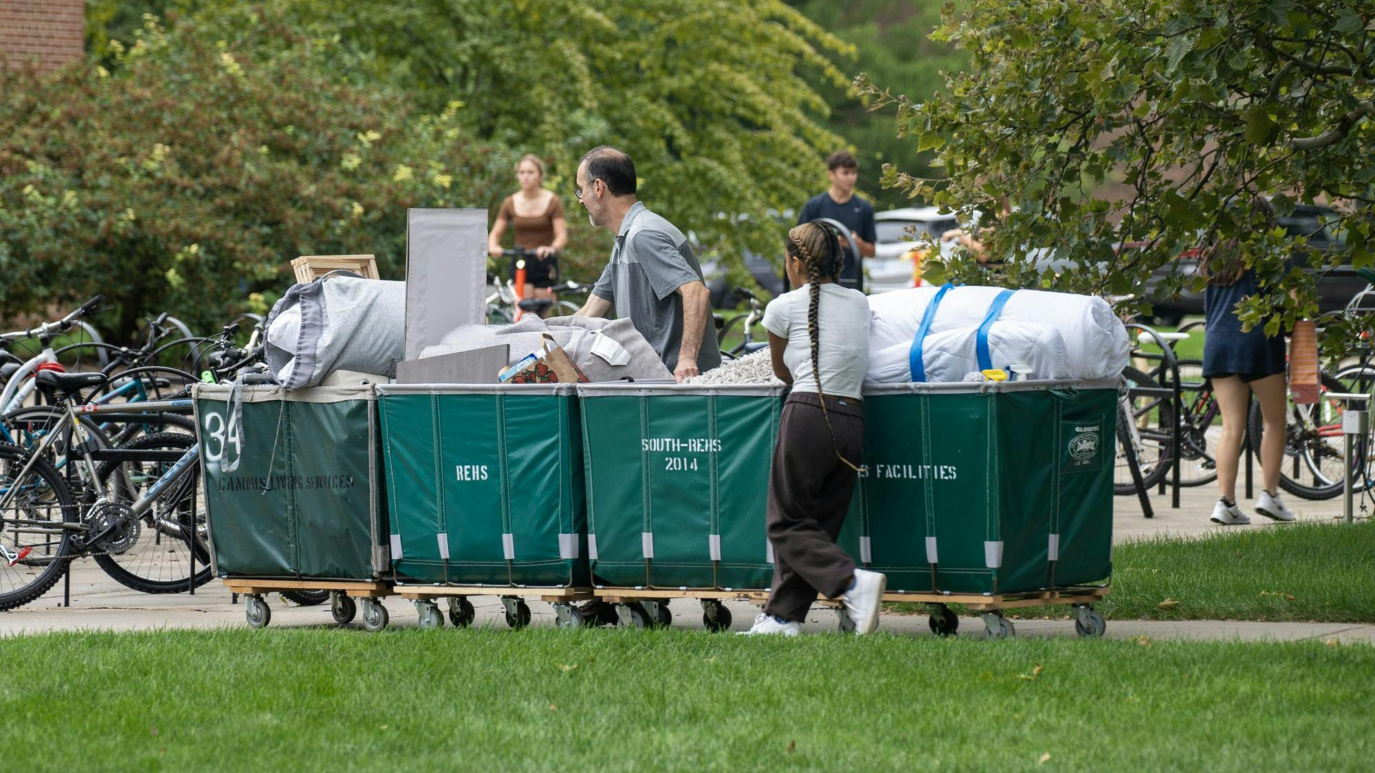 <p>Four luggage carts for one dorm room on August 24, 2023.</p>