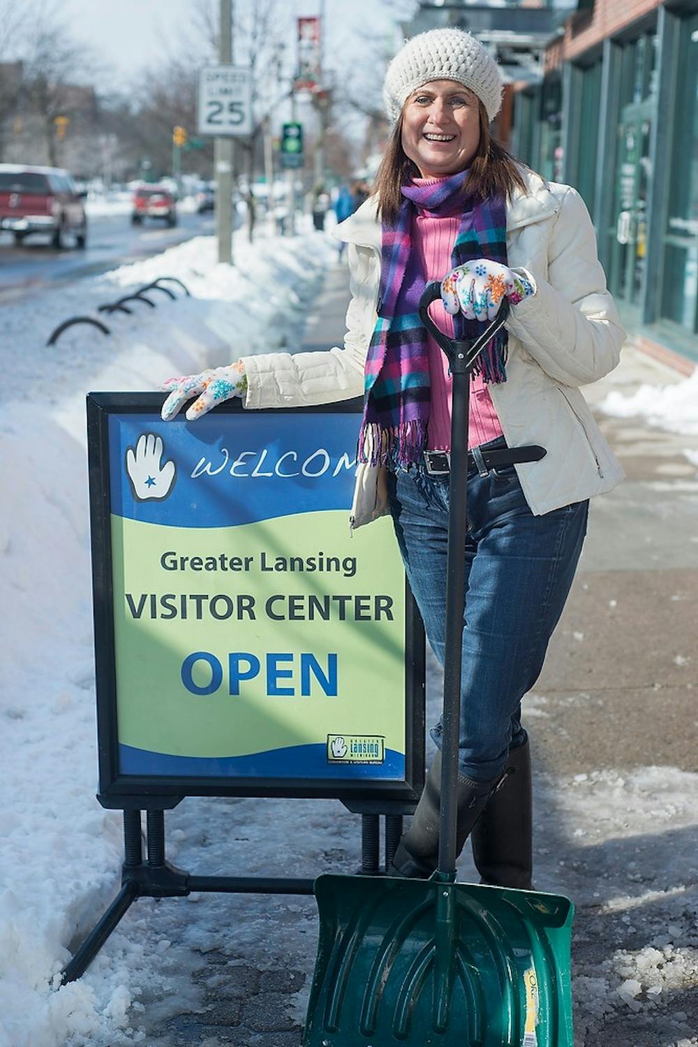 <p>Visitor information specialist Barb Doyal poses for a portrait Feb. 3, 2015, outside where she works at the Greater Lansing Visitor Center, 549 E. Grand River Avenue in East Lansing. The Greater Lansing Visitor Center opened in November 2012 to help build a stronger community between Lansing and East Lansing.</p>