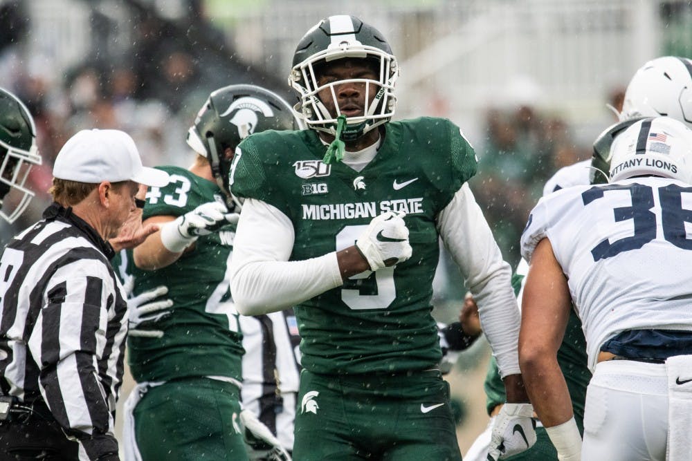 <p>Junior safety Dominique Long (9) pounds his chest during the game against Penn State Oct. 26, 2019 at Spartan Stadium. The Spartans fell to the Nittany Lions, 28-7.</p>