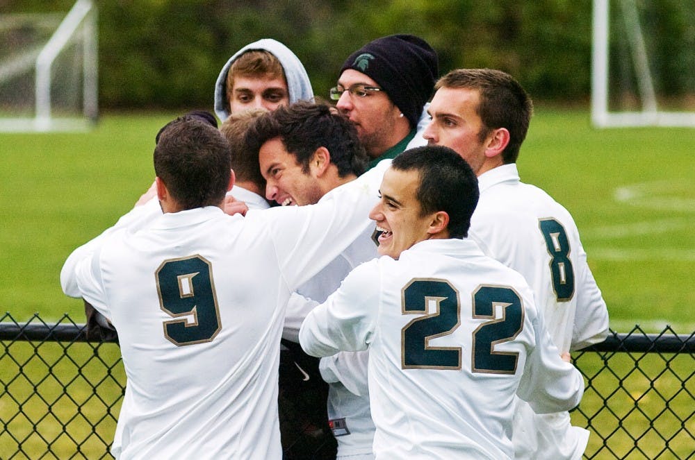 	<p>Junior midfielder Domenic Barone, center, celebrates with his teammates and fans after he scored late in the second half to put the Spartans up 2-0 over Oakland University in the first round of the 2010 <span class="caps">NCAA</span> Tournament. <span class="caps">MSU</span> worked through the spring exhibition schedule to increase team chemistry and work on gaining experience for younger players. </p>