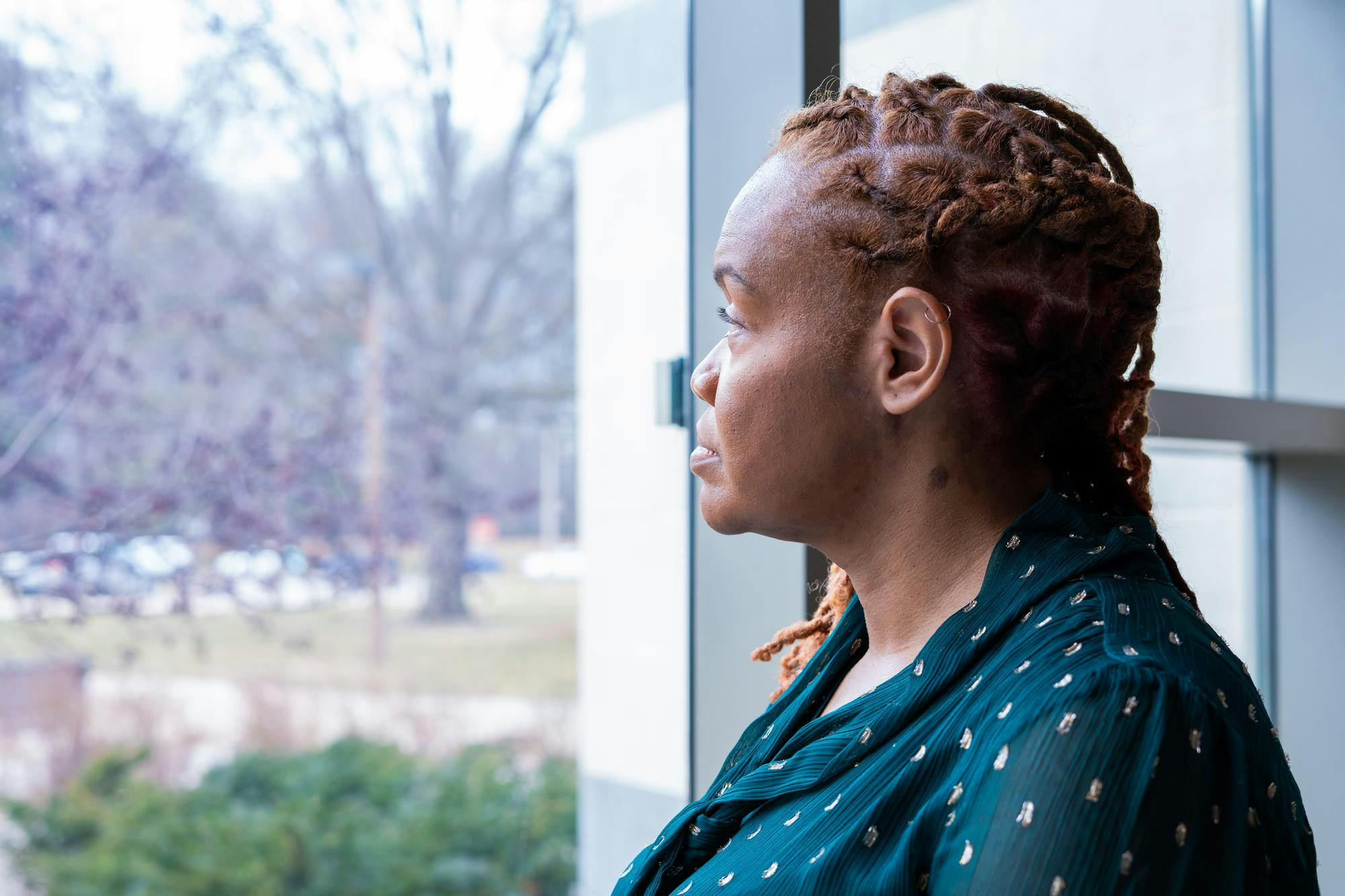 Dr. Krista Walker, assistant dean of DEI for MSU's College of Nursing, poses for a portrait in the Life Science Building lobby on Feb. 22, 2024.