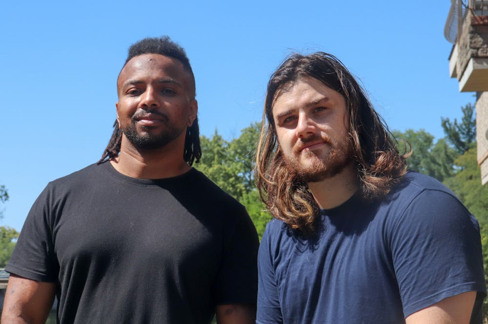 <p>Of Virtue band members Damon Tate and Tyler Ennis pose outside on Sept. 8, 2022. </p>
