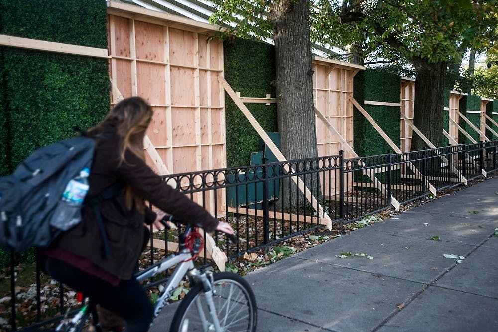 <p>Walls under construction stand Oct. 6, 2014, outside of Eli and Edythe Broad Art Museum. Erin Hampton/The State News</p>