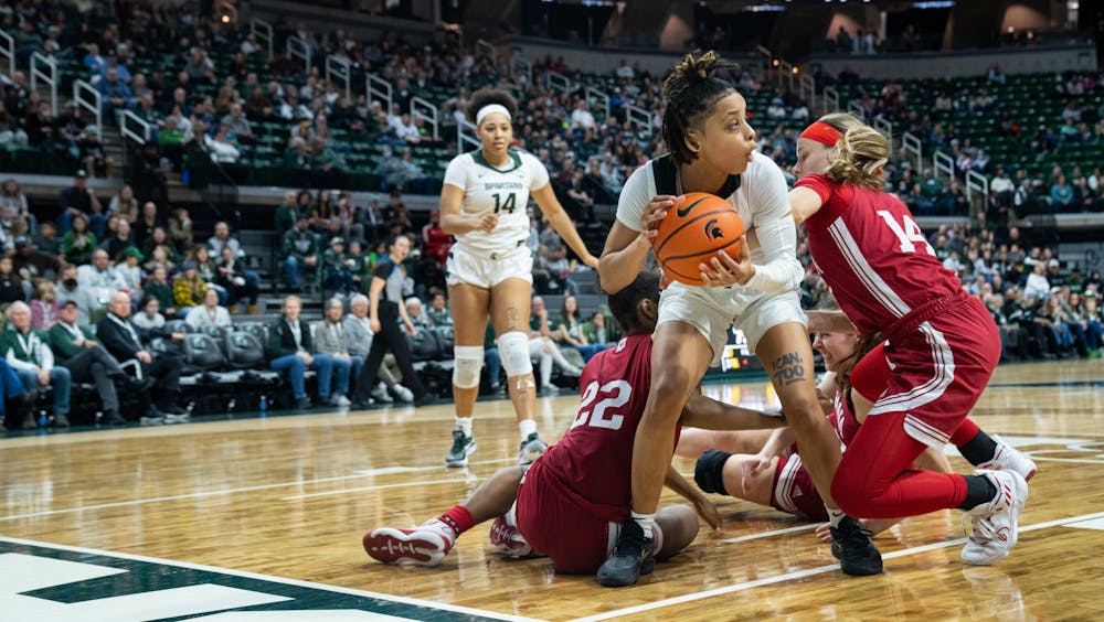 <p>DeeDee Hagemann (0) goes to pass the ball during the Spartan&#x27;s 83-78 win against the Hoosiers on Dec. 29, 2022.</p>