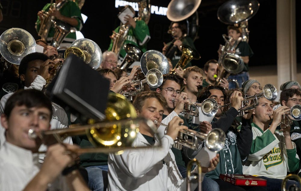 <p>The MSU marching band plays during the MSU vs. Notre Dame men’s hockey game in the Munn Ice Arena on Nov. 16, 2024.</p>