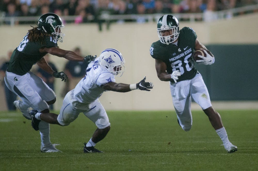 Senior wide receiver Monty Madaris runs up the sideline during the home football game against Furman on Sept. 2, 2016 at Spartan Stadium.  Madaris had five receptions for 85 yards.