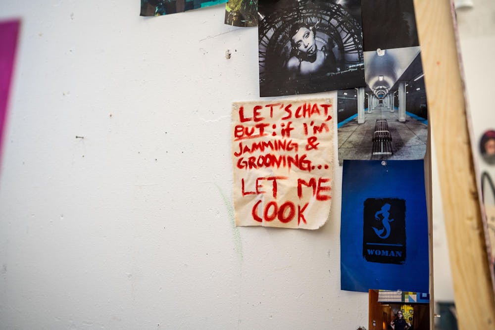 Fourth-year Michigan State studio art student Evan Yalowitz studio at Kresge Art Center on April 4, 2025. “A lot of what drives all of my pieces is just music,” Yalowitz said. “I get very into it. I made a little sign on my wall that says Let Me Cook. If I’m grooving — let me cook.”