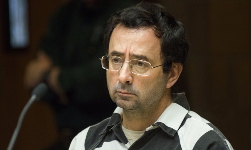 <p>Former MSU employee Larry Nassar looks towards the 55th District Court Judge Donald L. Allen Jr. during the preliminary examination on Feb. 17, 2017 at 55th District Court in Mason, Mich. The preliminary examination occurred as a result of former MSU employee Larry Nassar's alleged sexual abuse.</p>