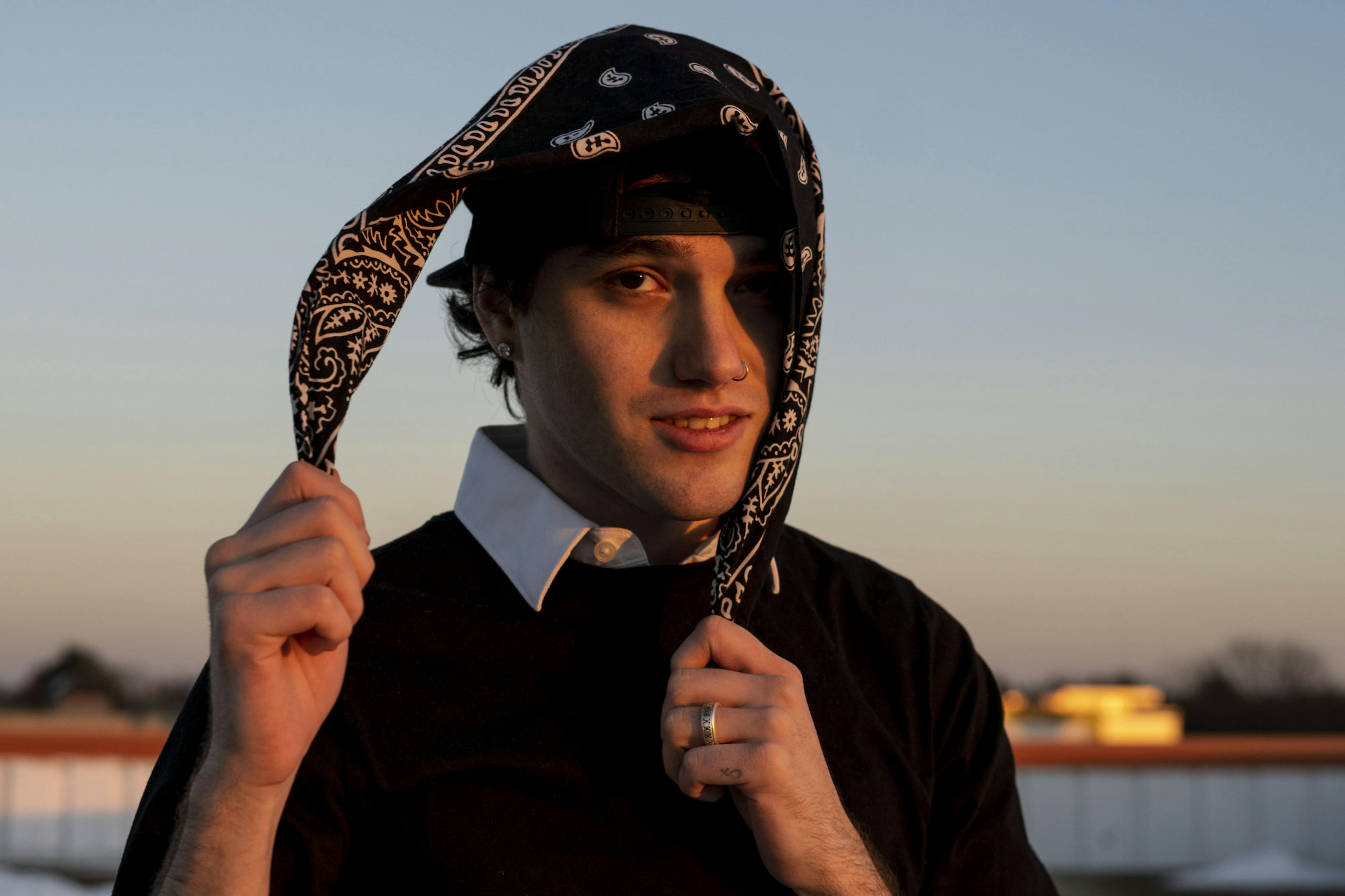 Trey Mullin known as Xotrey poses for a photo at the Division Street Garage on Nov. 21, 2022. He's been making rap music for seven years. He recently dropped his debut album, “THINGS WILL NEVER BE THE SAME,” and he’s about to clear 30,000 monthly listeners on his Spotify page.﻿