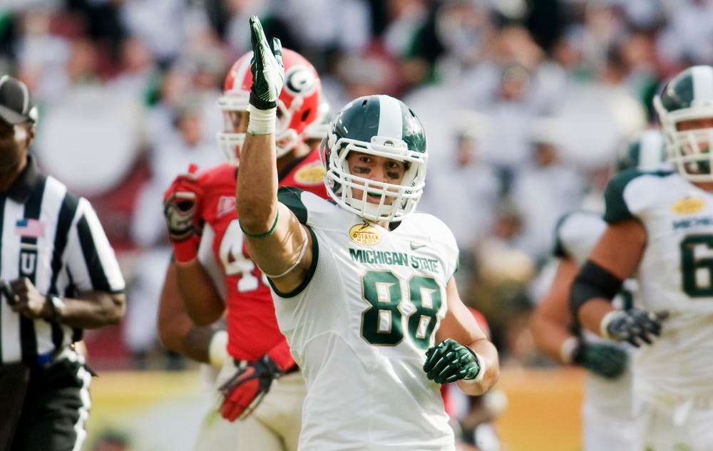 Senior tight end Brian Linthicum celebrates after scoring a  touchdown. The Michigan State Spartans defeated the Georgia Bulldogs in triple overtime, 33-30, Monday afternoon at Raymond James Stadium in Tampa, Fla. at the Outback Bowl. Justin Wan/The State News