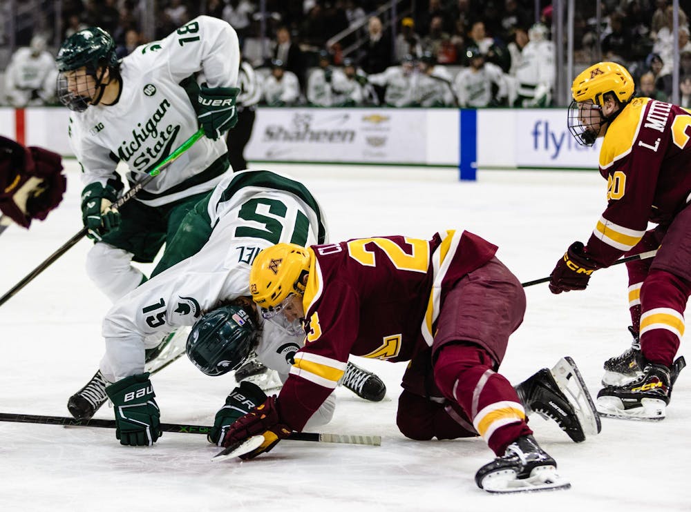 <p>MSU Sr. F, Charlie Stramel (15), battles for the puck against Minnesota at Munn Ice Arena in East Lansing, MI on Jan. 23, 2026.</p>