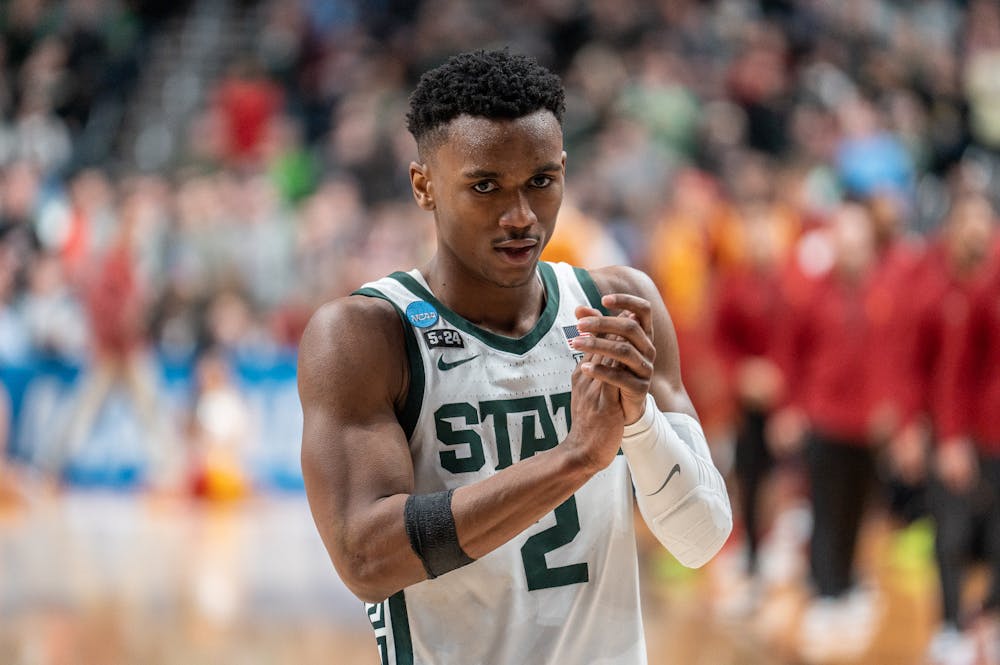 Senior guard Tyson Walker claps as time expires at Nationwide Arena in Columbus, Ohio on March 17, 2023. The Spartans beat the Trojans, 72-62 in the first round of March Madness.
