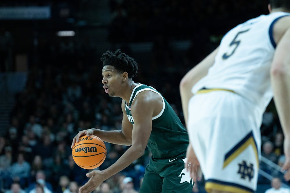 <p>Junior guard A.J. Hoggard dribbling during the Notre Dame v. MSU game held at the Joyce Center on November 30, 2022. The Spartans lost to the Fighting Irish 52 -70.</p>