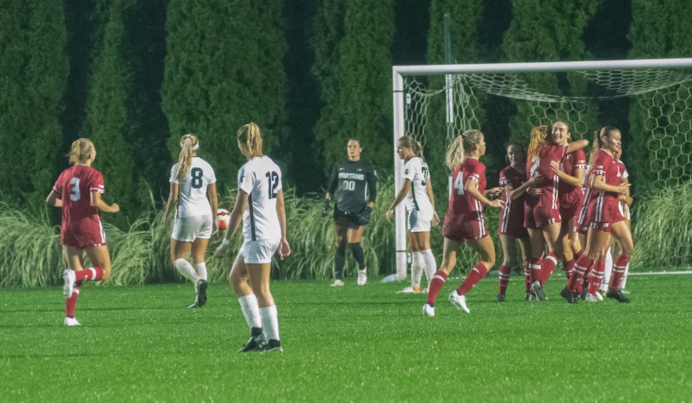 <p>University of Wisconsin women&#x27;s soccer team celebrates after scoring a goal on Sept. 23, 2021.</p>