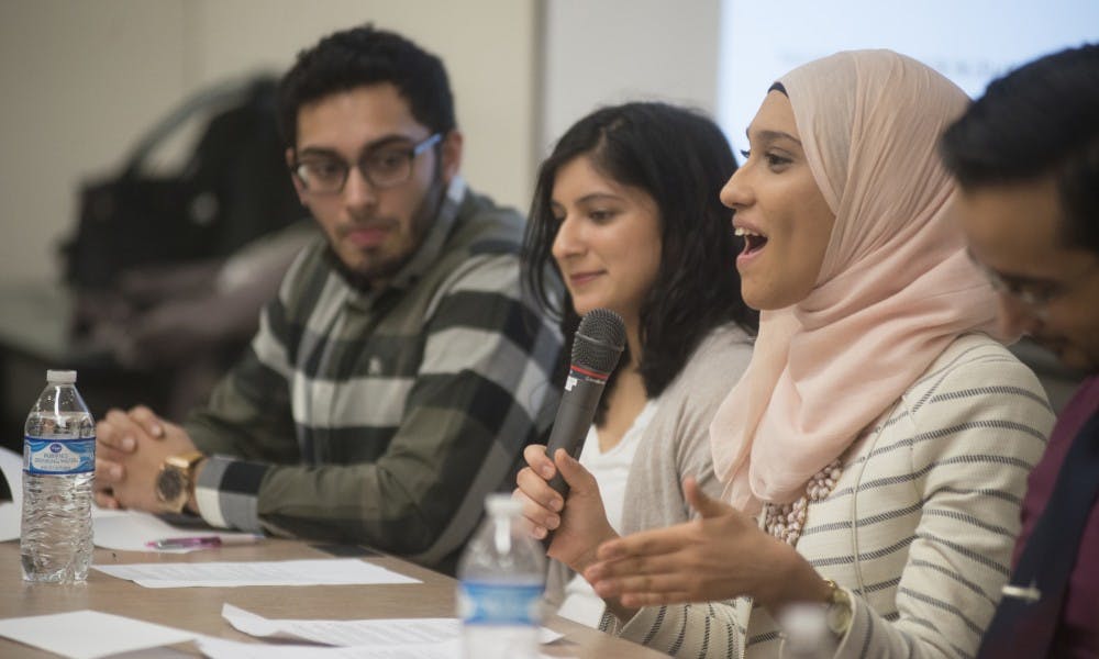 First year osteopathic medicine Heba Osma speaks during a student panel "Legacies of the Past, Visions for the Future: Stories From Your Muslim Neighbors" hosted by Diversity Community of MSUCOM at Fee Hall on Feb. 23, 2016.
