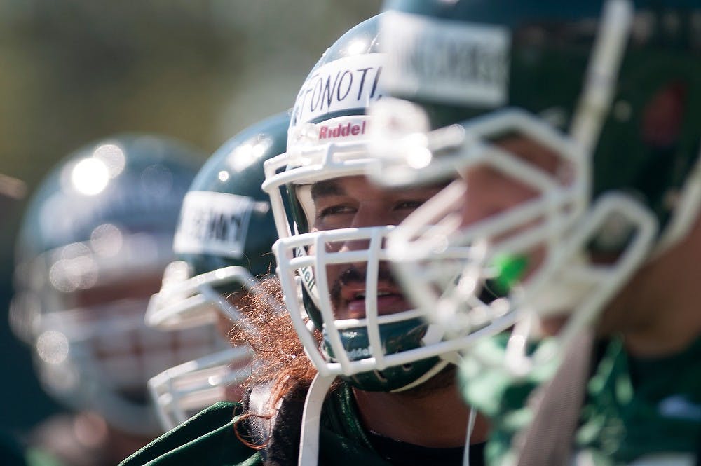 	<p>Senior offensive tackle Fou Fonoti lines up during practice Aug. 3, 2013, at the practice field outside Duffy Daugherty Football Building. Fonoti and the Spartans are preparing to return to Fonoti&#8217;s home state to take on Stanford in the Rose Bowl on Jan. 1.  Julia Nagy/The State News</p>