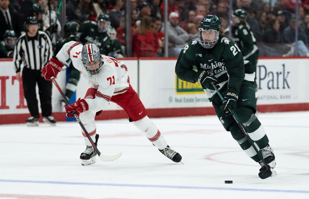 Freshman forward Karsen Dorwart (28) makes his way down the ice during a game against Ohio State University at Schottenstein Center on Jan. 7, 2023. The Spartans lost to the Buckeyes with a score of 6-0.
