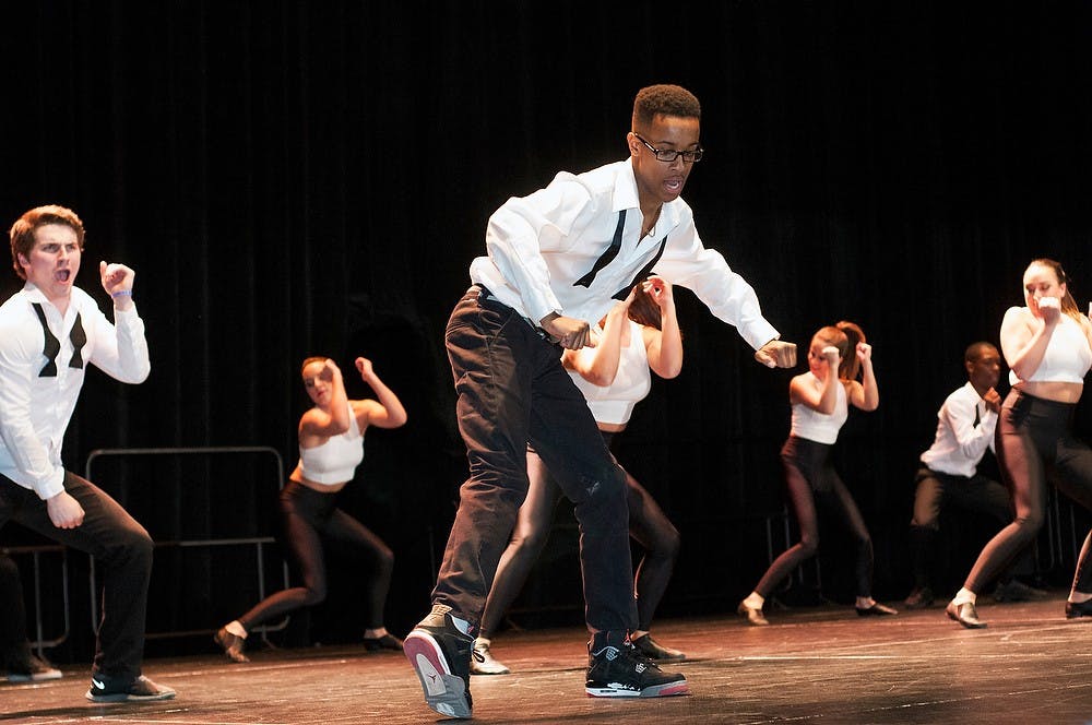 <p>Advertising sophomore Kyle Hall performs during MTV Night on April 8, 2014 at Breslin Center. Hall is a member of the Sigma Nu fraternity. Allison Brooks/The State News</p>