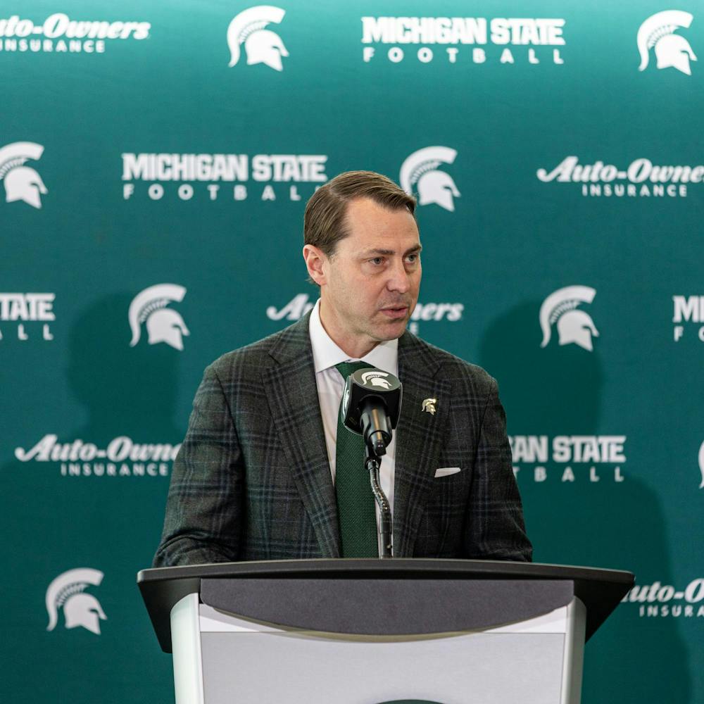 MSU AD J Batts introduces MSU's new football HC Pat Fitzgerald before his MSU welcome speech in the Tom Izzo football building in East Lansing, MI on Dec. 2, 2025.
