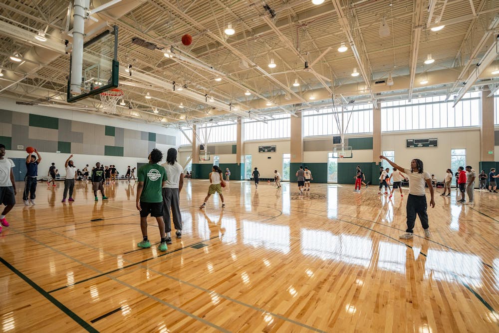 <p>Michigan State University students play basketball in the Student Recreation and Wellness Center during its open house in East Lansing, MI on April 15, 2026.</p>